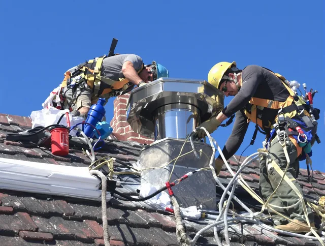 Protective chimney cap installed by Rocky River Chimney Sweep in Rocky River, OH