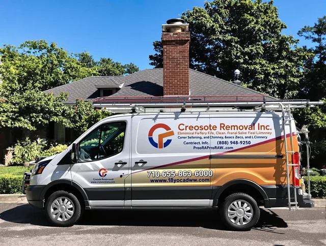 Rocky River Chimney Sweep technician removing creosote safely in Rocky River, OH