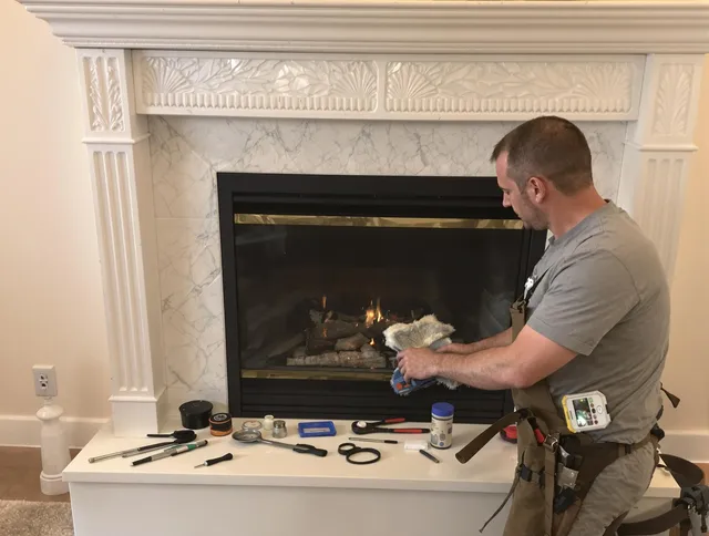 Rocky River Chimney Sweep performing fireplace maintenance in Rocky River, OH